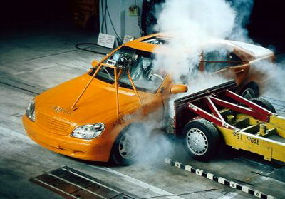 Standard side impact crash test configuration in a W220 S-Class, but with elevated speed to test structural safety and occupant loading
