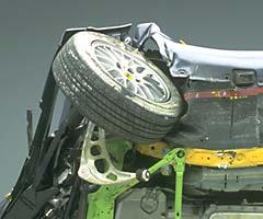 Moderate intrusion into the footwell area bent the dummy's ankle sharply, and forces on the left tibia indicate the possibility of lower leg injury