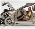 The dummy's position in relation to the steering wheel and instrument panel after the crash test indicates that the driver's survival space was maintained very well
