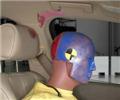 Smeared greasepaint indicates where the dummy’s head hit the B-pillar, roof rail, grab handle, and head restraint. Head accelerations from these hits were low