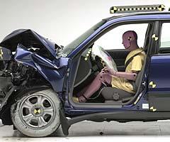 The dummy's position in relation to the steering wheel and instrument panel after the crash test indicates that the driver's survival space was maintained well