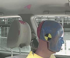 Smeared greasepaint indicates where the dummy's head hit the roof liner during rebound. Head acceleration from this hit was negligible