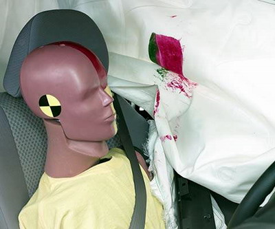 Smeared greasepaint shows where the driver dummy's head was protected from being hit by hard structures by the side curtain airbag