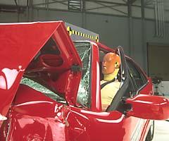 Dummy movement during the crash wasn't well controlled - the dummy's head finished between the roof rail and door frame